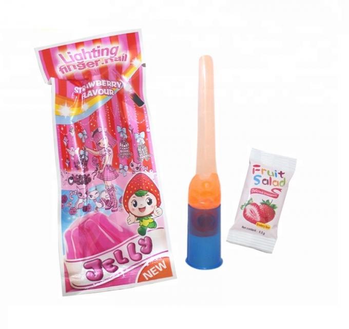 El juguete del clavo del finger enciende para arriba los dulces coloridos de la jalea del caramelo para las fiestas de cumpleaños